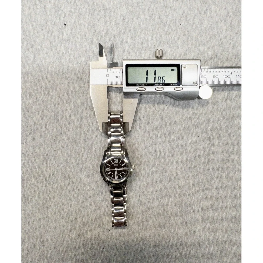 Citizen Women's Eco-Drive Silver Stainless Steel 25mm 10ATM Watch‎ E011 Movement